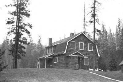 From Wellner collection,  Bunkhouse complete with refrigerator hutch left of side door.