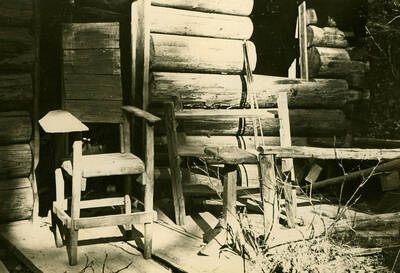 Photos series of the buildings found on the Arthur Demorest claim, settled 1906 near the mouth of Demorest Creek.  Photos are glued to black kraft paper and hanging in the 3rd floor hallway, Moscow Forest Sciences Laboratory.  These photos appeared in the 1936 Annual Report. No other descriptions available.