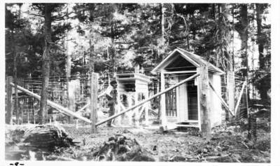 Completed half-cut inflammability station, showing George Jemison at instrument shelter.