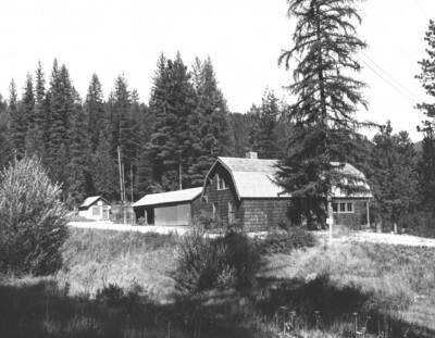 Left-fuel house, 5 stall garage, and shop.