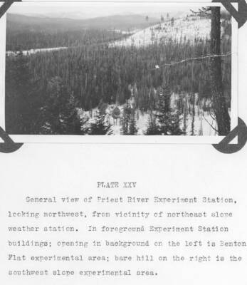 Plate XXV caption:"General view of Priest River Experiment Station, looking northwest, from vicinity of northeast slope weather station. In foreground Experiment Station buildings; opening in background on the left is Benton Flat experimental area; bare hill on the right is the southwest slope experimental area."