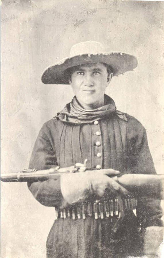 Reproduction of a tintype photograph of J. W. Redington,  a volunteer U.S. scout . Taken at Fort Boise, Idaho during the Bannock Indian War.