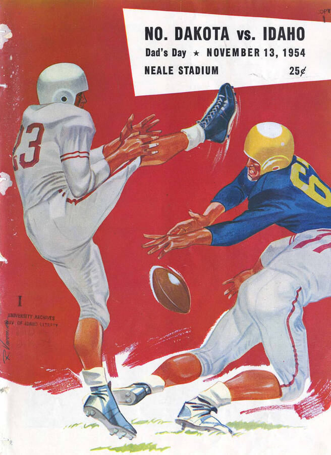 Official souvenir program of the Idaho - North Dakota State University football game, Saturday, November 13, 1954, Neale Stadium, Moscow (Idaho). Dad's Day. Cover depicts a picture of a football player in white uniform who has punted the ball, with his teammate defending him with a tackle as an opponent tries to interfere.