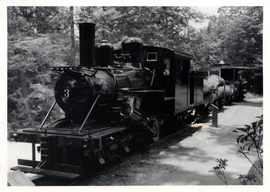A black and white photograph of the Climax Locomotive