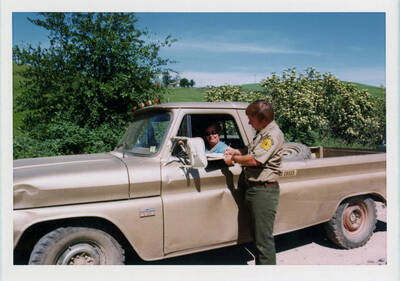 Ken Till - USFS Heliport Locater talking to landowner