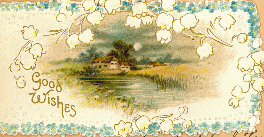 A picturesque scene featuring a rural landscape with cottages by a pond, surrounded by fields and trees. The image is bordered with floral motifs, predominantly featuring white and blue flowers. The words "Good Wishes" are written on the left side.
