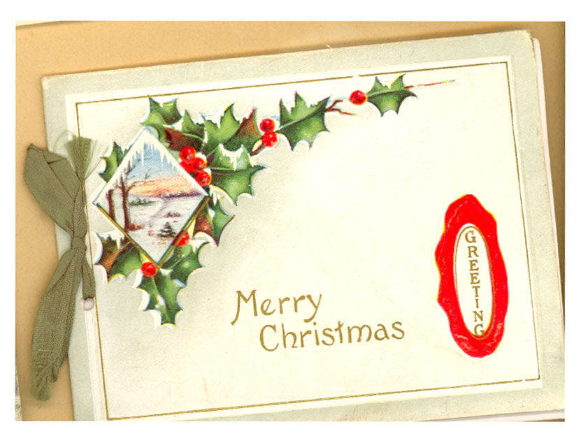 A card with a decorative border of holly leaves and berries. There is a small winter scene featuring trees and snow in a diamond-shaped frame. The text reads "Merry Christmas." On the right, a red seal contains the word "Greeting." The card is tied with a green ribbon on the left side.