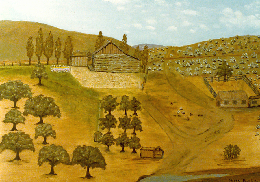 A rural landscape with rolling hills dotted with small, scattered shrubs. In the foreground, there are rows of trees and two small wooden buildings. A path leads through a field toward a larger log building near a group of tall trees. There is a fenced area with another small building on the right, and a body of water is visible in the lower section.