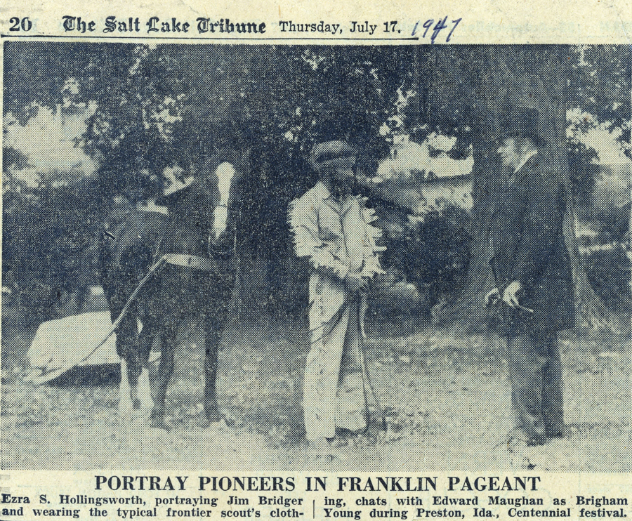 Two men are standing outdoors in front of a horse. One is dressed in frontier scout clothing, while the other is in formal attire, holding a hat. The setting includes trees in the background. The text reads: "The Salt Lake Tribune, Thursday, July 17, 1947. Portray Pioneers in Franklin Pageant. Ezra S. Hollingsworth, portraying Jim Bridger and wearing the typical frontier scout's clothing, chats with Edward Maughan as Brigham Young during Preston, Ida., Centennial festival."