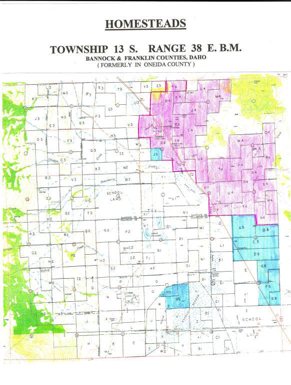 A map titled "Homesteads" for Township 13 S, Range 38 E.B.M. in Bannock and Franklin Counties, Idaho, formerly in Oneida County. The map shows a grid with numbered sections and markings. Areas are shaded in green, purple, and blue. The words "School Land" appear in some sections. Numerous dots and labels are present within the grid.