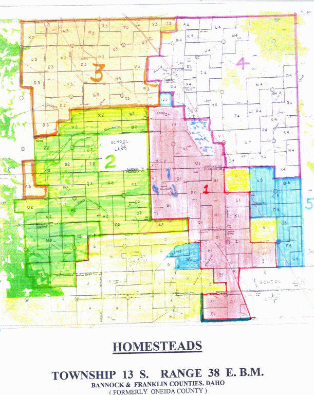 A map divided into five distinct numbered areas, each marked with different colors. Area 1 is shaded in red, area 2 in green, area 3 in yellow, area 4 in pink, and area 5 in blue. The map is labeled with the title "Homesteads" at the bottom, along with "Township 13 S. Range 38 E.B.M." It mentions Bannock & Franklin Counties, Idaho, noting it was formerly Oneida County. The map contains grid lines and labeled squares such as A1, B2, and others. There's a designated "school land" area within section 2.