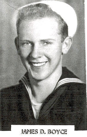 A young person is wearing a sailor's uniform, including a hat, and is smiling. Below the image, the text reads "JAMES D. BOYCE."