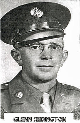 A person is wearing a military uniform with a cap. They have glasses and are looking forward. The words "GLENN REDINGTON" appear at the bottom.