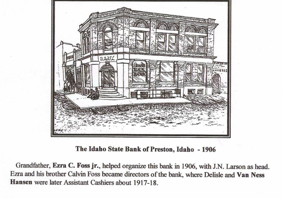 A drawing of a two-story brick building labeled "Bank" in the front. The sign reads "Idaho State Bank." There are stairs leading to double doors at the entrance. The building is situated on a street corner. Below the image, the caption reads: "The Idaho State Bank of Preston, Idaho - 1906." Additional text mentions Ezra C. Foss Jr., who helped organize the bank with J.N. Larson. Ezra and his brother Calvin Foss became directors of the bank, with Delisle and Van Ness Hansen as assistant cashiers around 1917-18.