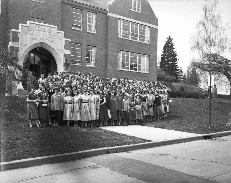 The Home Economics students class photo, taken outside of the Home Economics building.