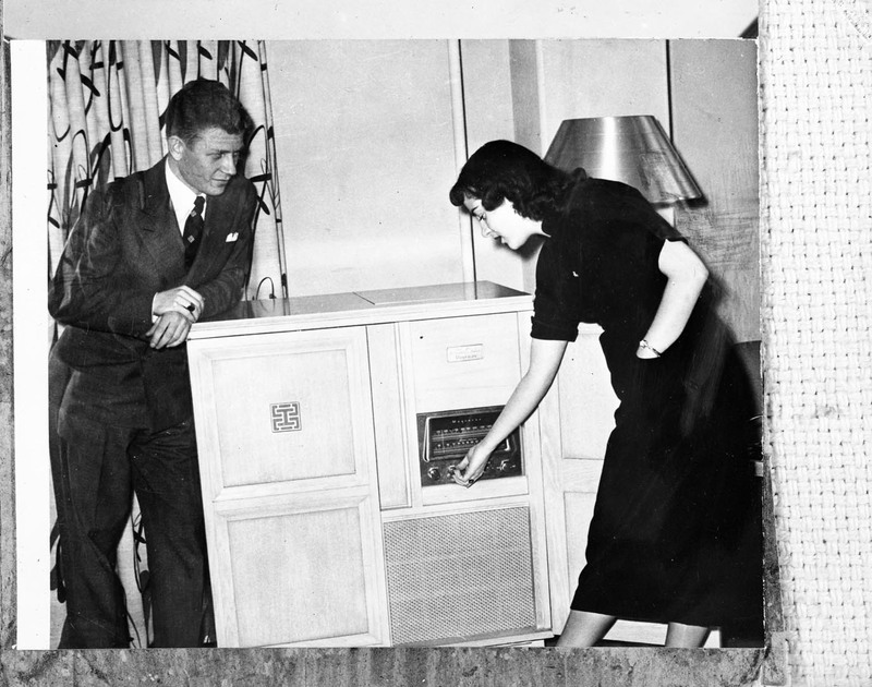 Helen Daniels entertains her Italian duke with the Bucket radio.