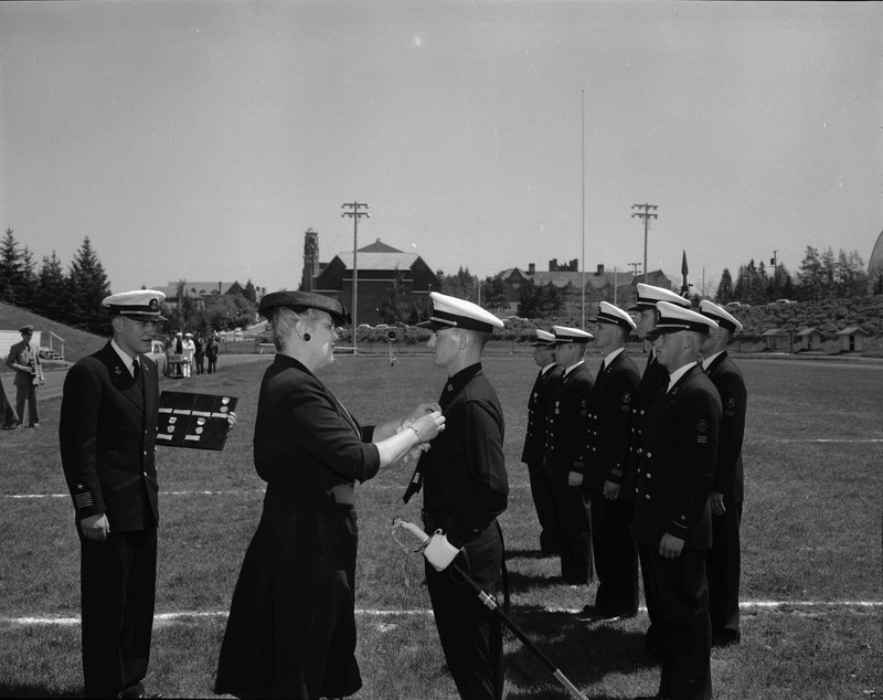 Navy ROTC receiving awards at ceremony.