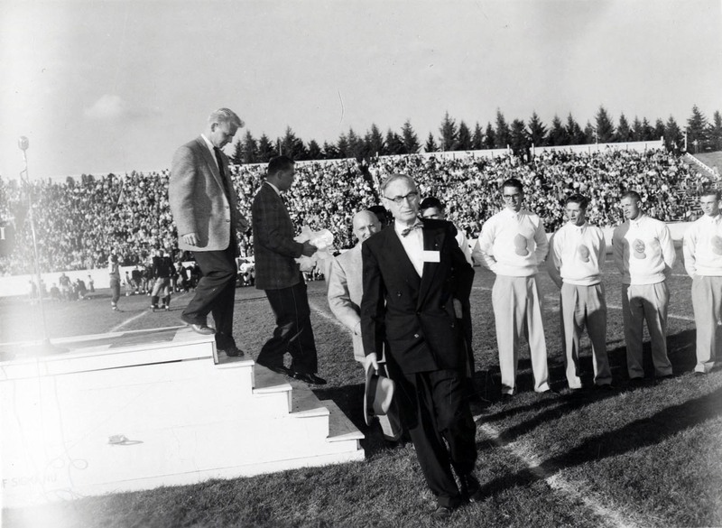 President Theophilus and others exit the stage during the Homecoming game.