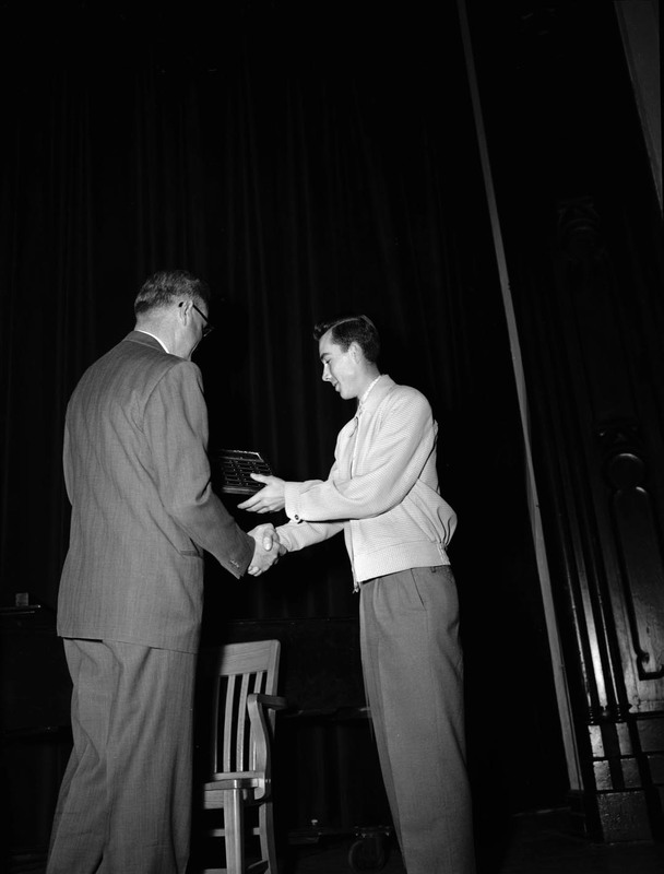 University of Idaho president J.E. Buchanan handing out awards.