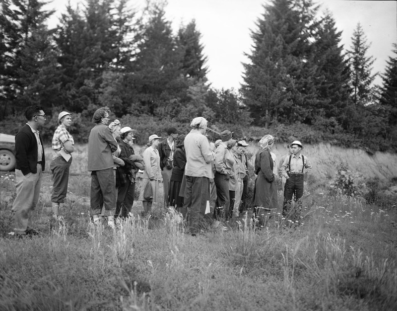 Students gather on a hilltop during a summer hiking class.