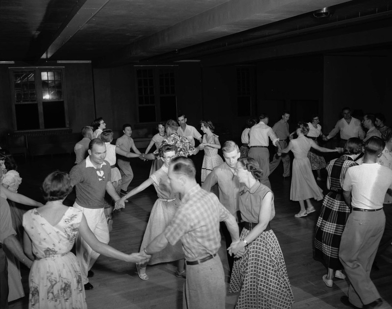 Students square dance for summer classes.