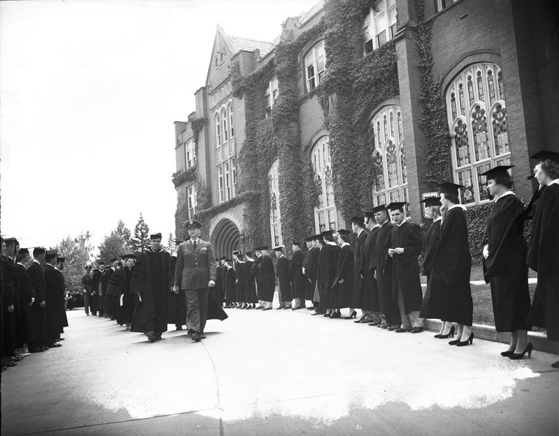 Faculty lead the procession to Memorial Gym where Commencement is held.