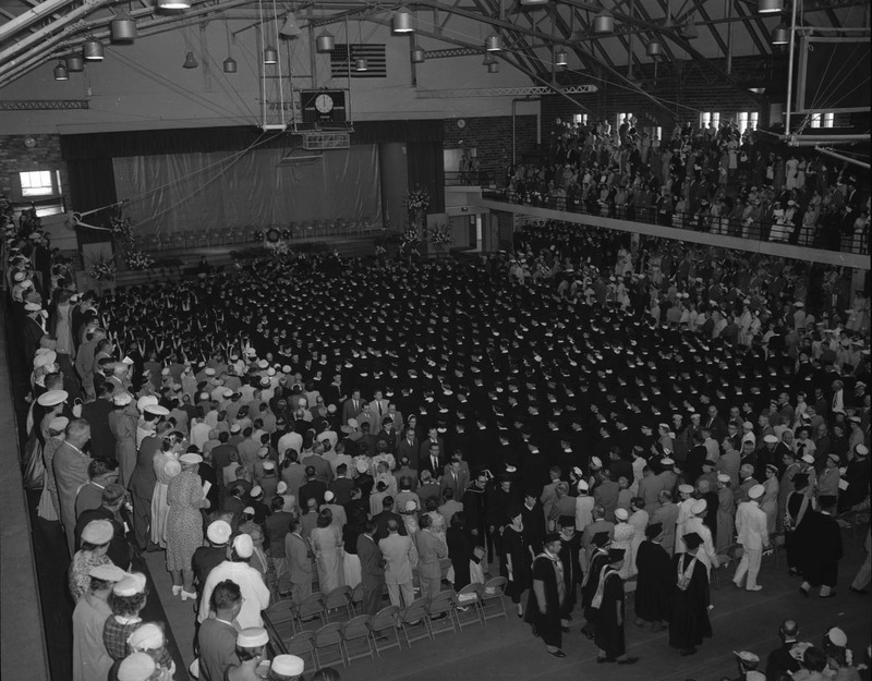 Students gather in the Memorial Gym for Commencement.