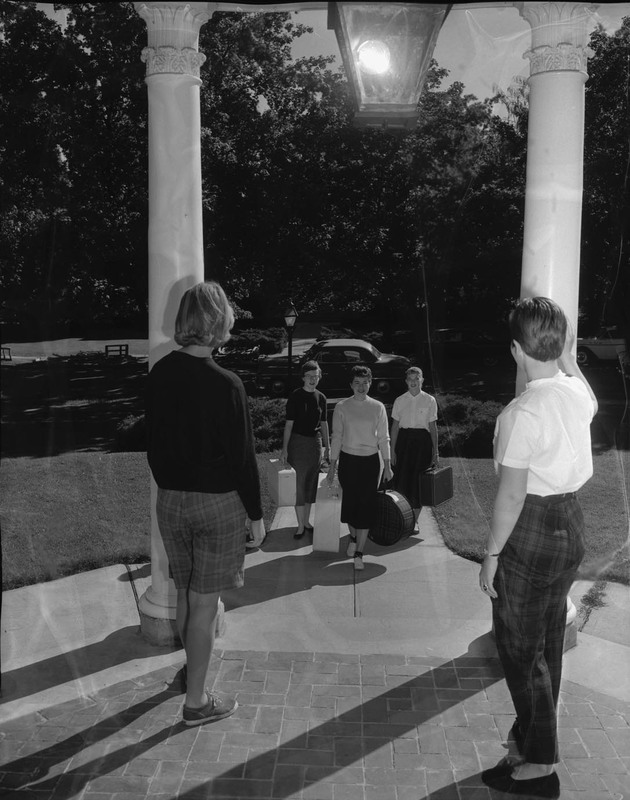 Delta Delta Delta students(l-r): Margaret Sullivan, Mary Lou Walcott, Kay Sommers, Patricia Kelley, and Claudia Parsel coming back to campus.