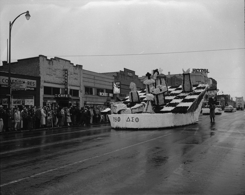 A fraternity float depicting a chess board.