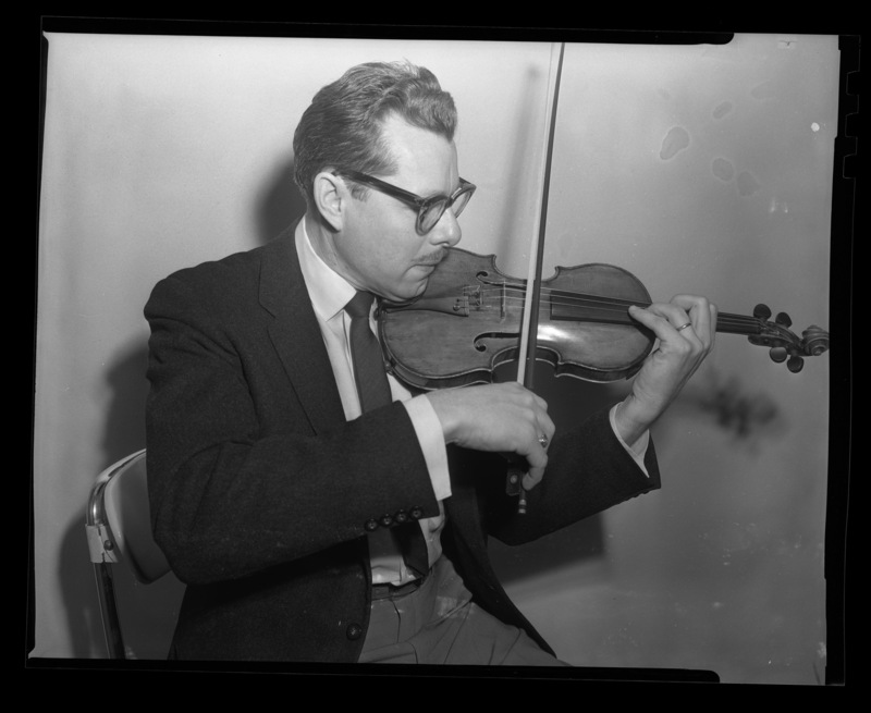 A portrait of University of Idaho Professor Leroy Bauer with his violin.