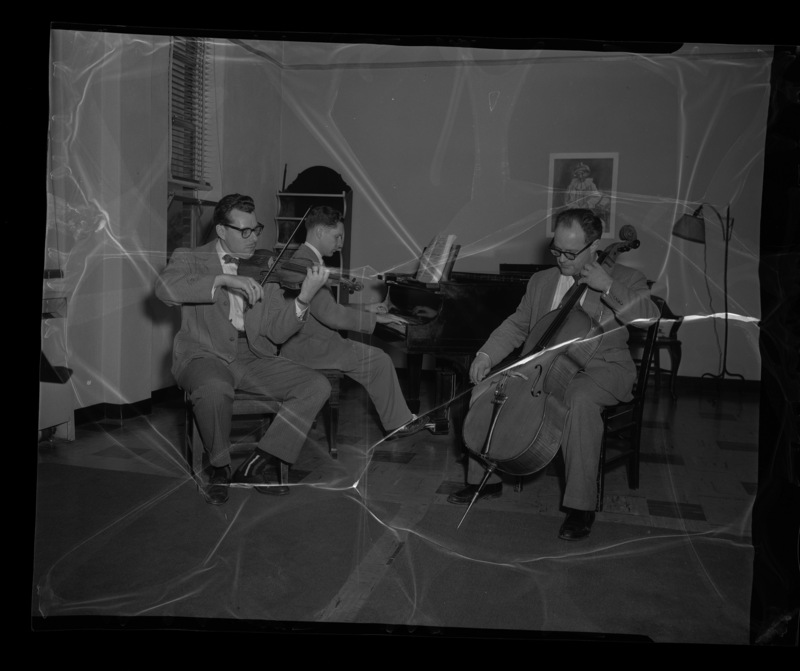 Faculty music trio LeRoy Bauer (violin), Steven Romanio (piano), and David Whisner (cello).