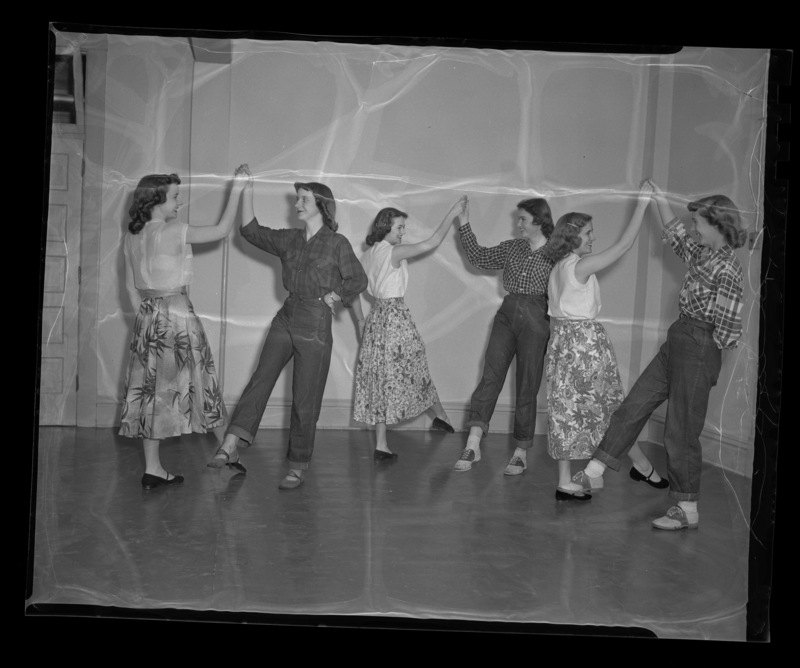 Three couples dance in a women's dance class at the University of Idaho.