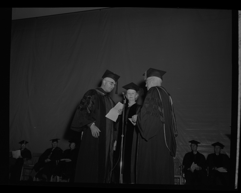 Commencement ceremony with Dean of the College of Letters and Science Boyd Martin (left), Commencement speaker and honorary degree recipient Inez Robb (center), and President Theopilus (right).