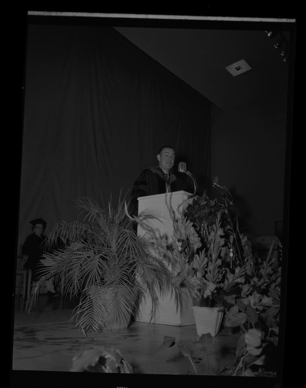 Governor Robert E. Smylie speaking at the 1959 Commencement ceremony in Memorial Gym.