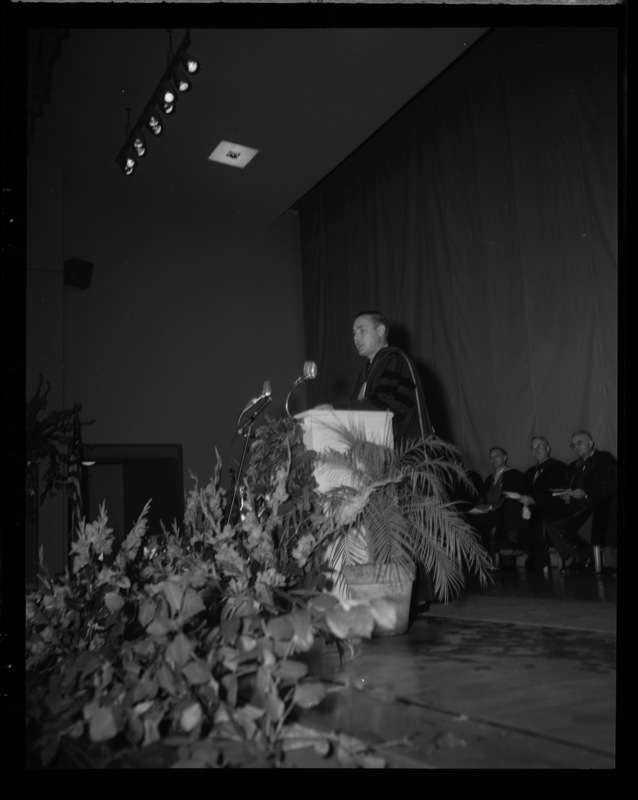 Governor Robert E. Smylie speaking at the 1959 Commencement ceremony in Memorial Gym.
