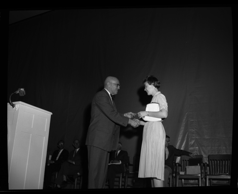 President Theophilus gives the Anna H. Hayes Memorial Award to Edna Mae Jones Neal at the 1960 May Fete
