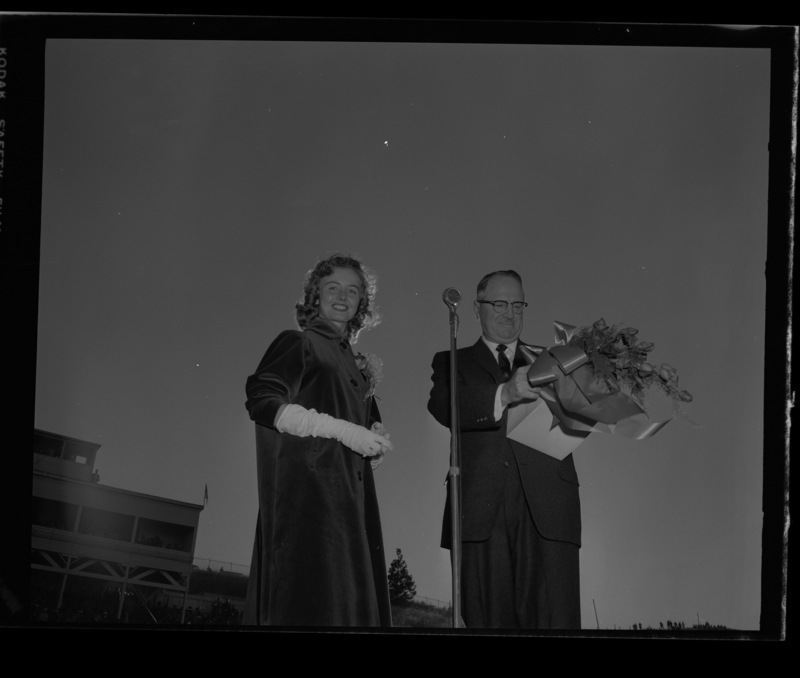 Homecoming queen Trenna Atchley being crowned by Elbert Stellmon, president of the Lewiston Alumni Chapter, during halftime at the 1959 Homecoming Game.