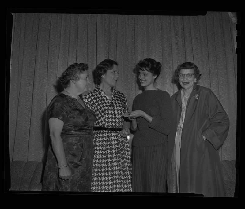 La Verda Garrison received a pendant award for "Outstanding Girl Editor" from at the 1960 hisgh school Journalism Conference at the University of Idaho. From left to right: Lucile McDonald of the Seattle Times, author Grace Jordon, Miss La Verda Garrison of Nampa, and Gladys Swank of the Lewiston Tribune.