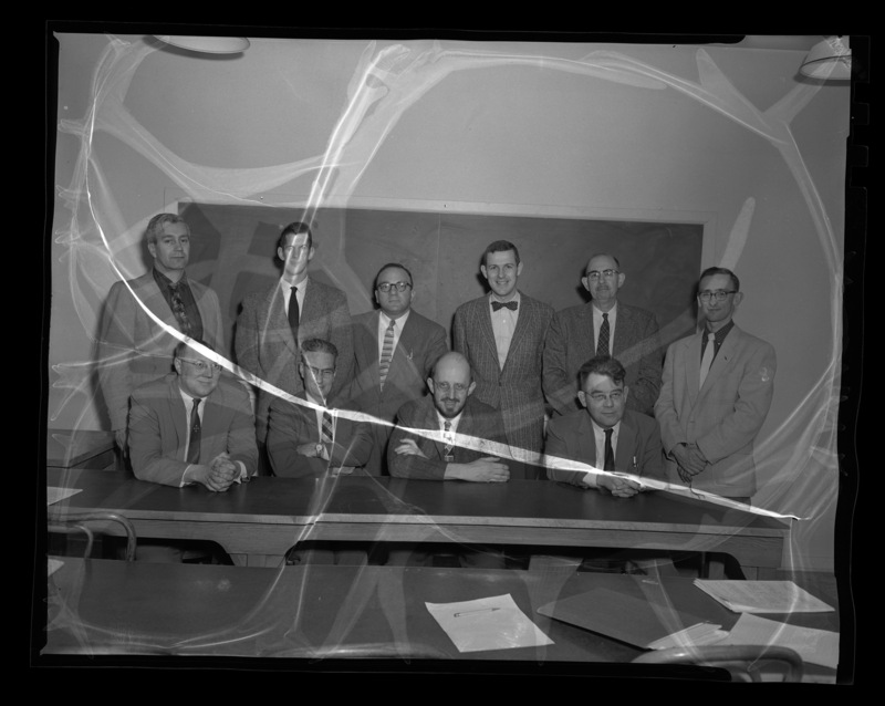 College of Mines faculty. (seated): E.F. Cook, G.A. Williams, D.F. Clifton, and J. Newton. (standing): K.E. Grinem, G. Maciwko, H. Caldwell, R. Jones, and W. Staley, R. Choate.