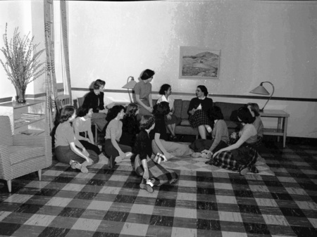 A group of women sitting in a lounge.