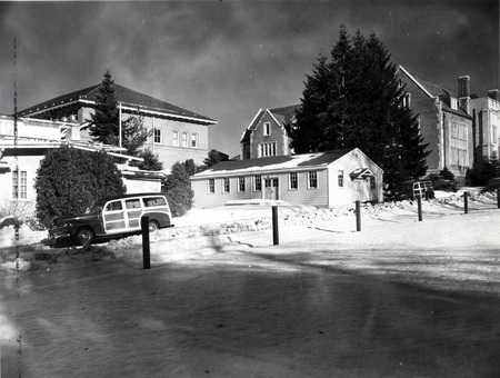 A view of a snowy street on campus