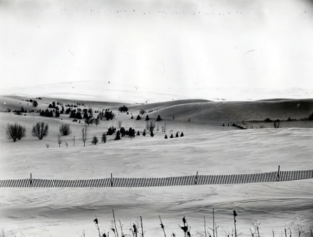 A landscape photograph of snowy hills in Moscow.
