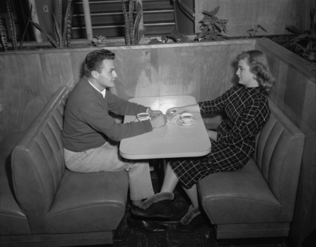 Two students have coffee in the Student Union Building.