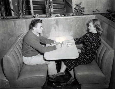 Two students have coffee in the Student Union Building.