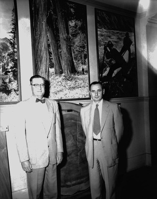 University of Idaho President J.E. Buchanan posing with new Dean of Forestry, Ernest Wohletz in the Natural Resources Building.