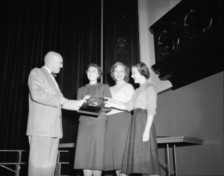 University of Idaho President Theophilus handing out awards.
