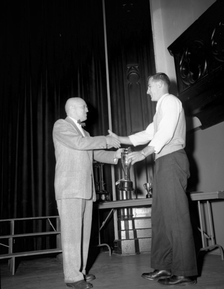 University of Idaho President Theophilus handing out awards.