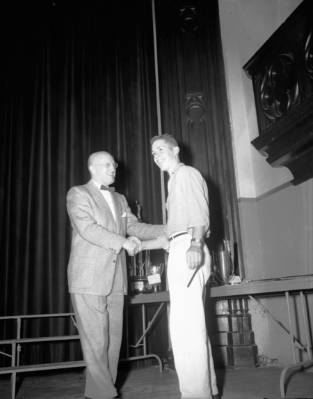 University of Idaho President Theophilus handing out awards.