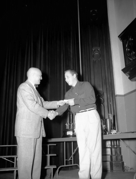 University of Idaho President Theophilus handing out awards.