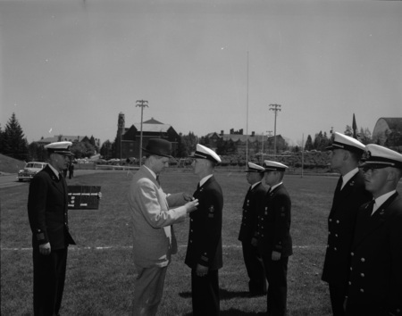 Navy ROTC receiving awards at ceremony.
